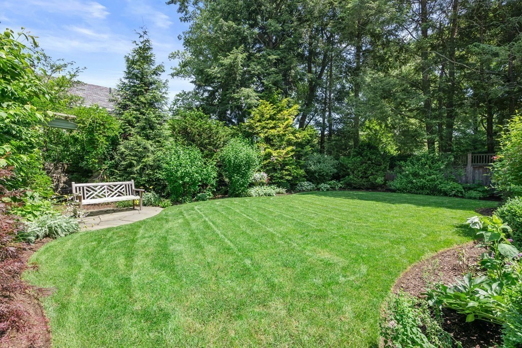 28 Monadnock Road Newton, MA 02467 - Photo 19 of 23 a backyard of a house with lots of green space