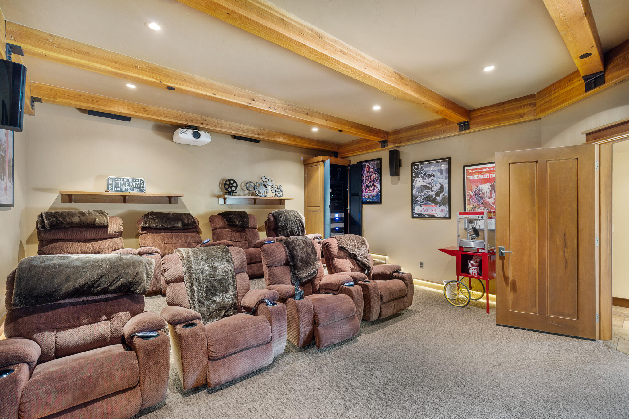 18883 Sutherland Court Bend, OR 97702 - Photo 35 of 70 Bring the cinema home?luxurious theater room designed for immersive entertainment.