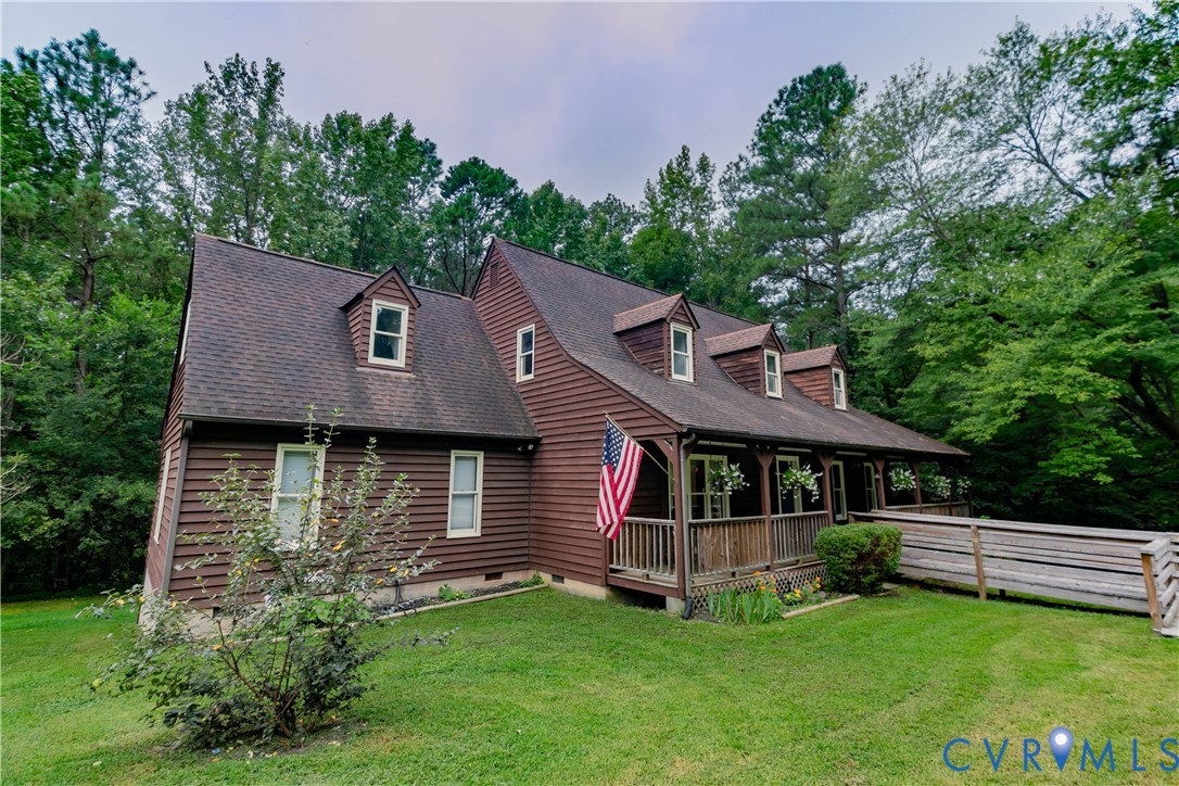 19321 River Road Chesterfield, VA 23838 - Photo 11 of 50 a aerial view of a house with a yard balcony and trees in the background