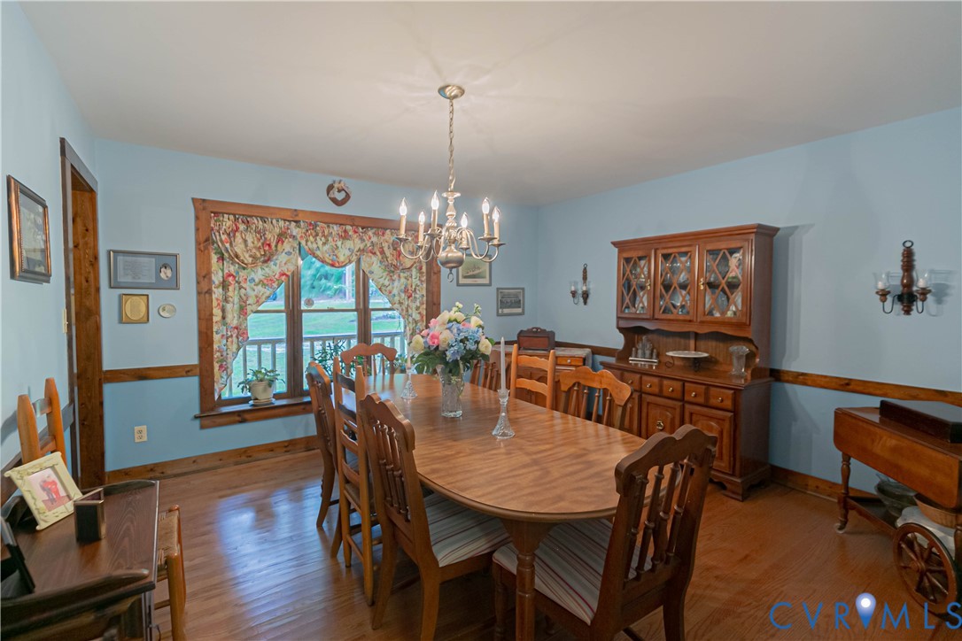19321 River Road Chesterfield, VA 23838 - Photo 20 of 50 a view of a dining room with furniture window and wooden floor