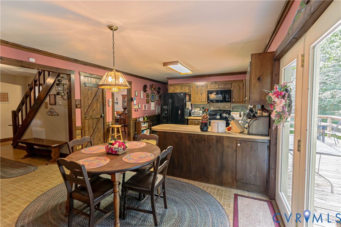 19321 River Road Chesterfield, VA 23838 - Photo 30 of 50 a view of a dining room with furniture window and outside view