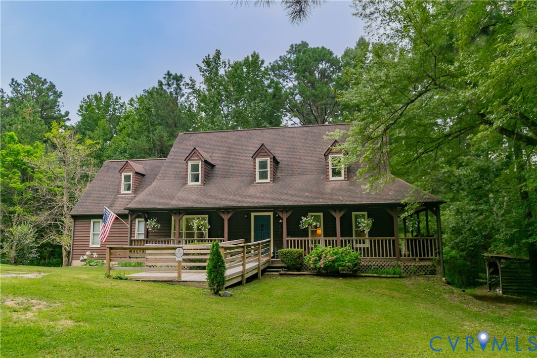 19321 River Road Chesterfield, VA 23838 - Photo 3 of 50 a aerial view of a house with a yard table and chairs