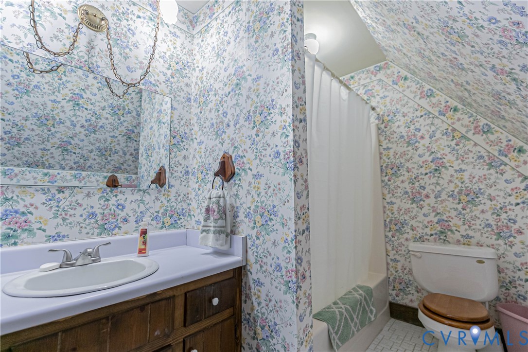 19321 River Road Chesterfield, VA 23838 - Photo 41 of 50 a bathroom with a sink and a mirror