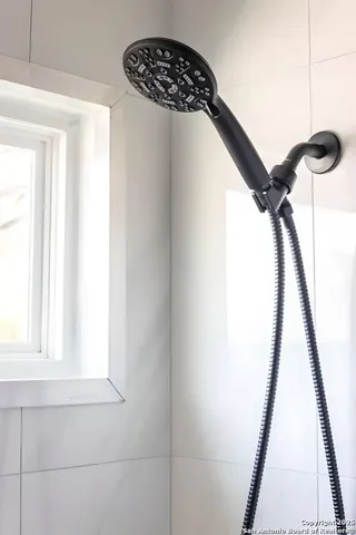 a view of staircase with a rug