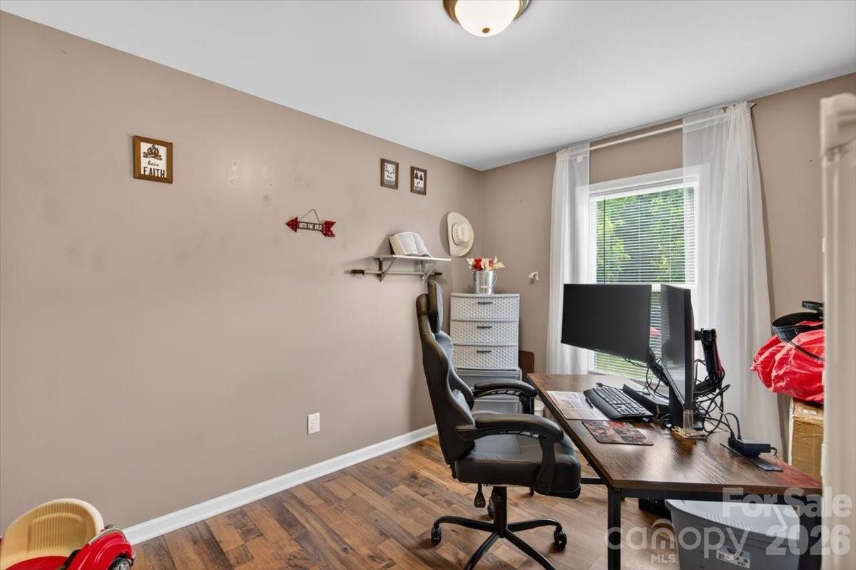 567 Godbey Road Mocksville, NC 27028 - Photo 14 of 38 a view of a workspace with furniture and a window