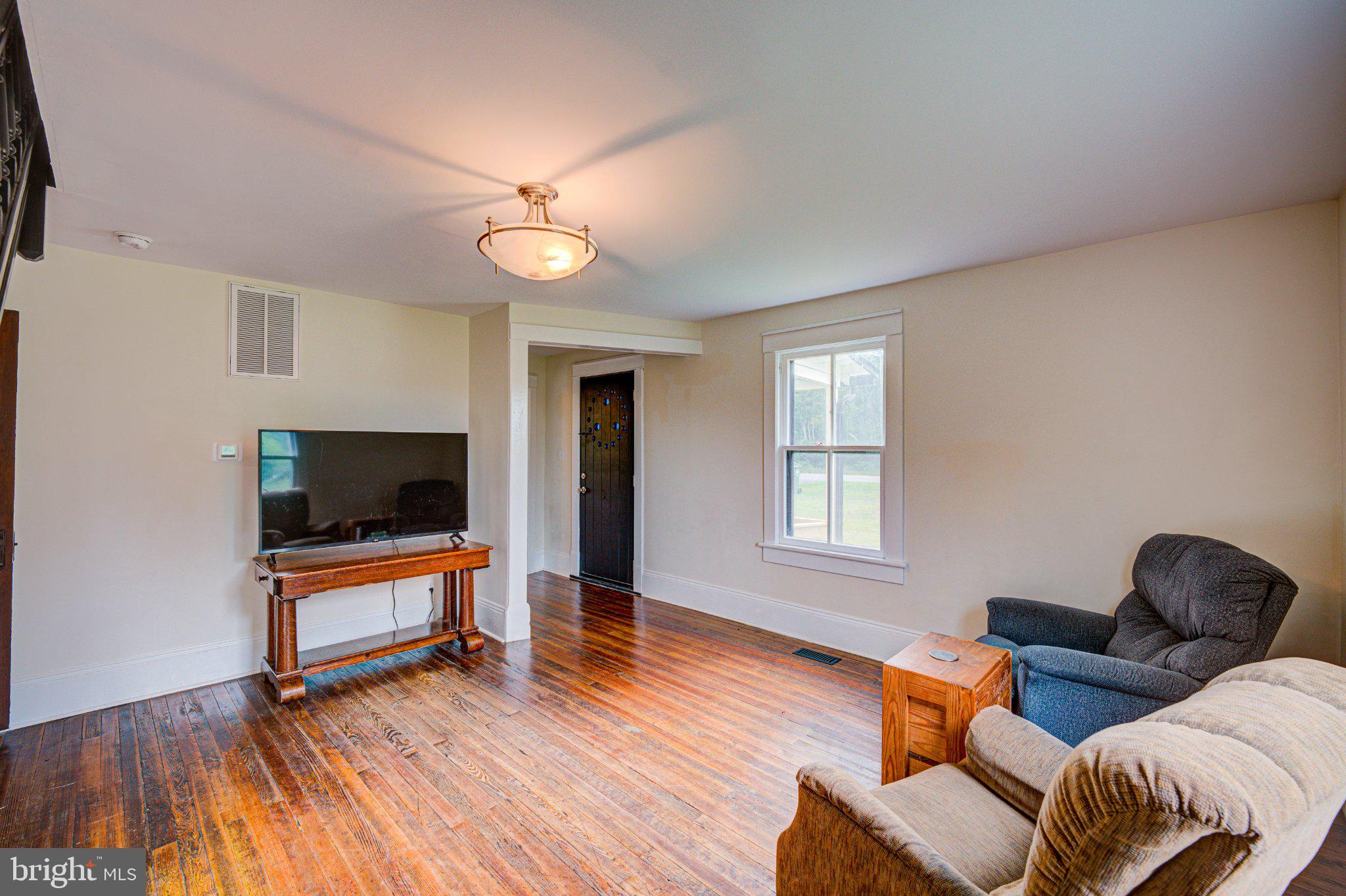 24177 Rapidan Road Mitchells, VA 22729 - Photo 13 of 43 Bright and inviting living space.