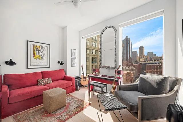 a view of room with hardwood flooring and faucet