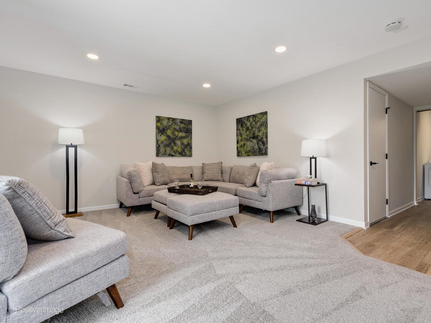 1475 Foxcroft Drive Aurora, IL 60506 - Photo 15 of 23 a living room with furniture and a lamp