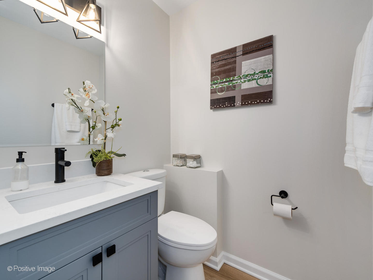 1475 Foxcroft Drive Aurora, IL 60506 - Photo 16 of 23 a bathroom with a toilet a sink and mirror