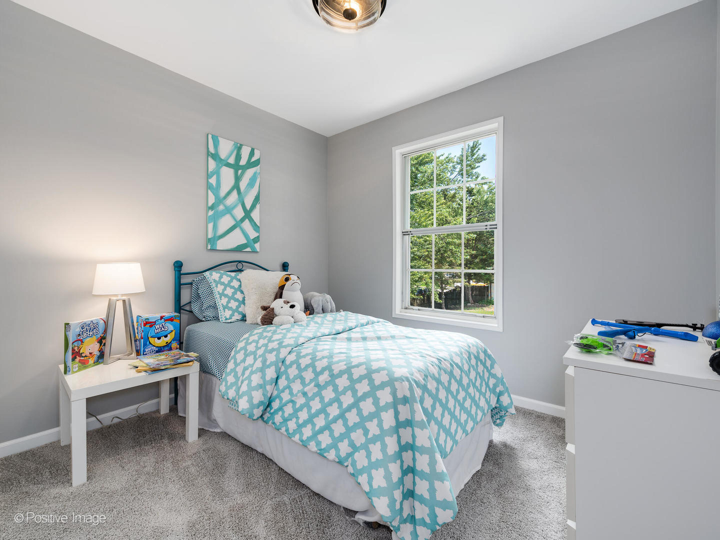 1475 Foxcroft Drive Aurora, IL 60506 - Photo 19 of 23 a bedroom with a bed a dresser and a window