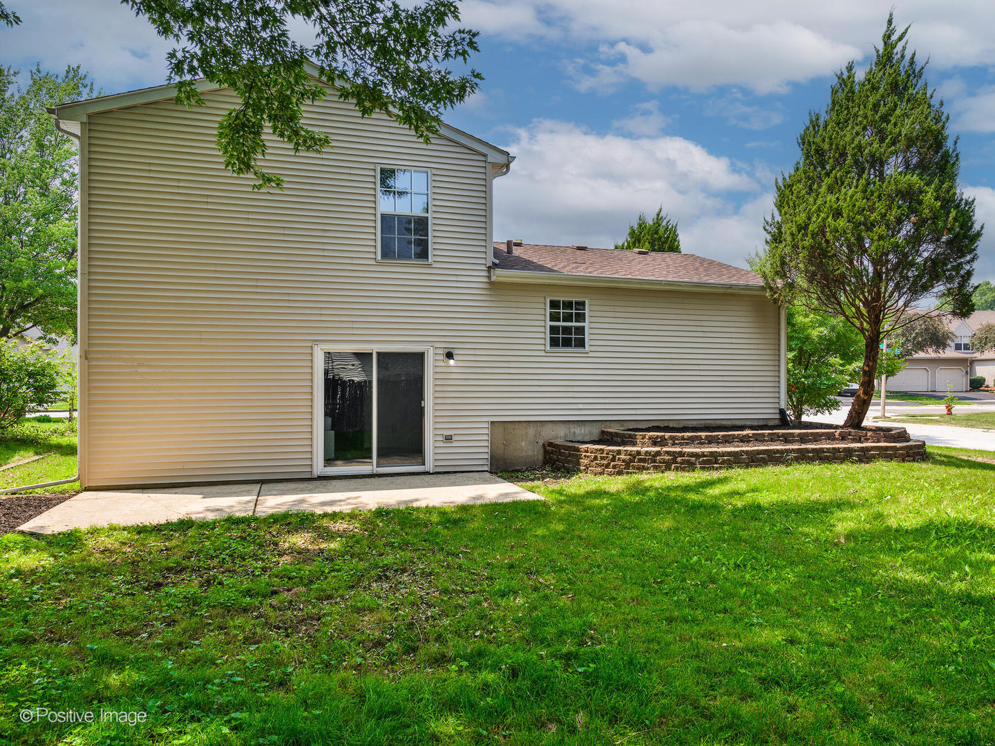 1475 Foxcroft Drive Aurora, IL 60506 - Photo 23 of 23 a front view of house with yard and green space