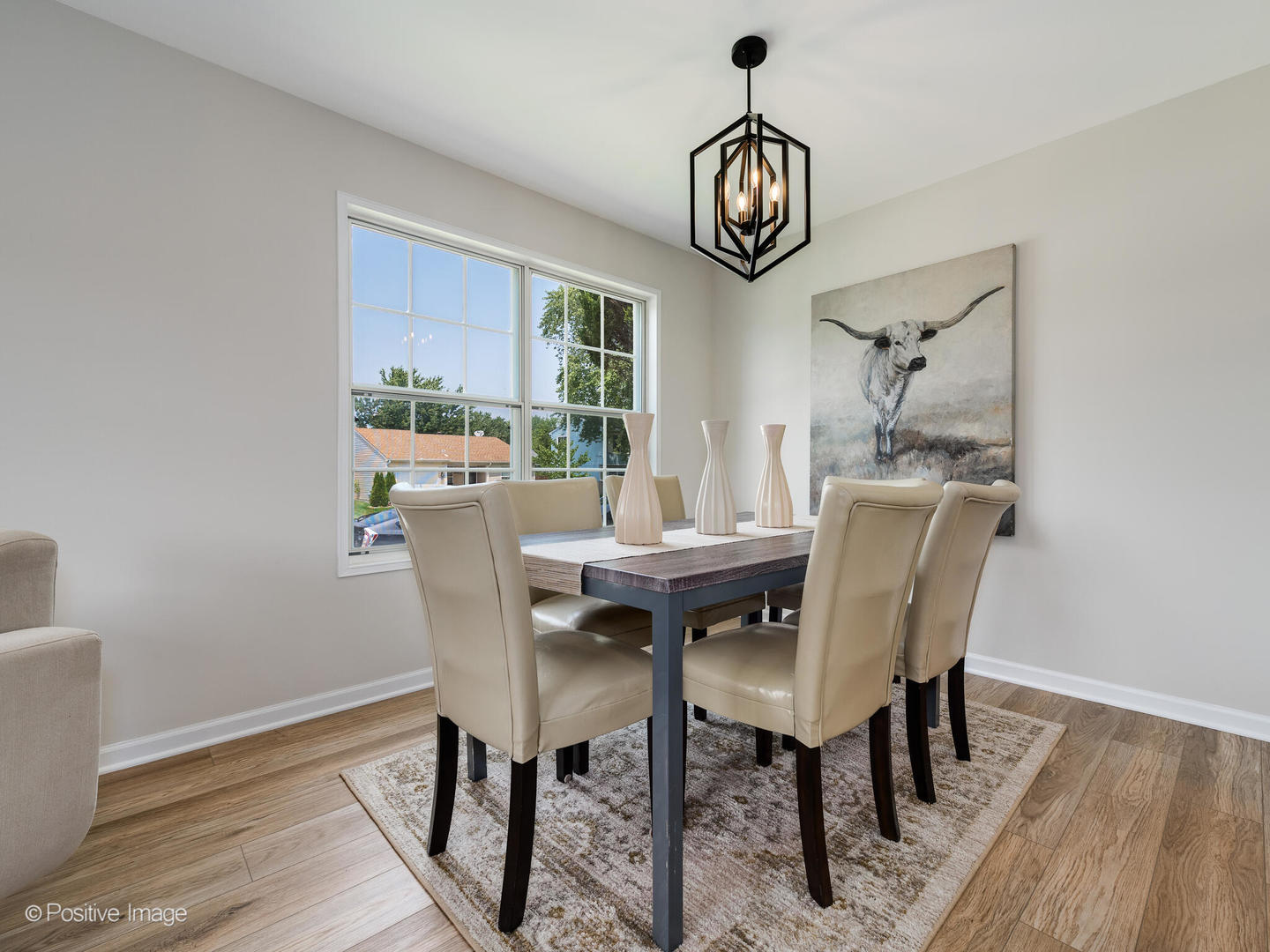 1475 Foxcroft Drive Aurora, IL 60506 - Photo 7 of 23 a view of a dining room with furniture window and wooden floor