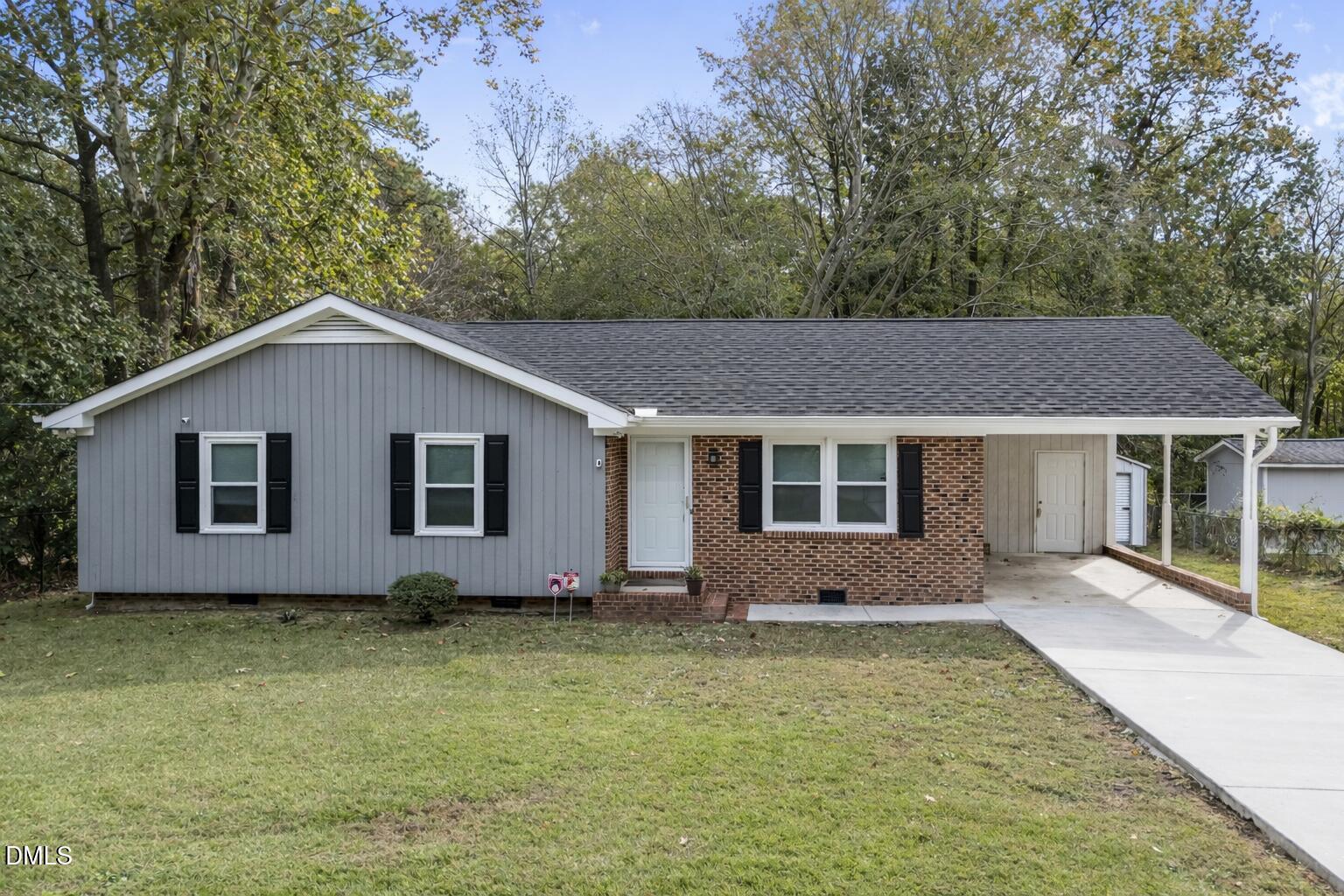 1509 Woodard Street Raleigh, NC 27610 - Photo 1 of 21 Front Exterior Enhanced