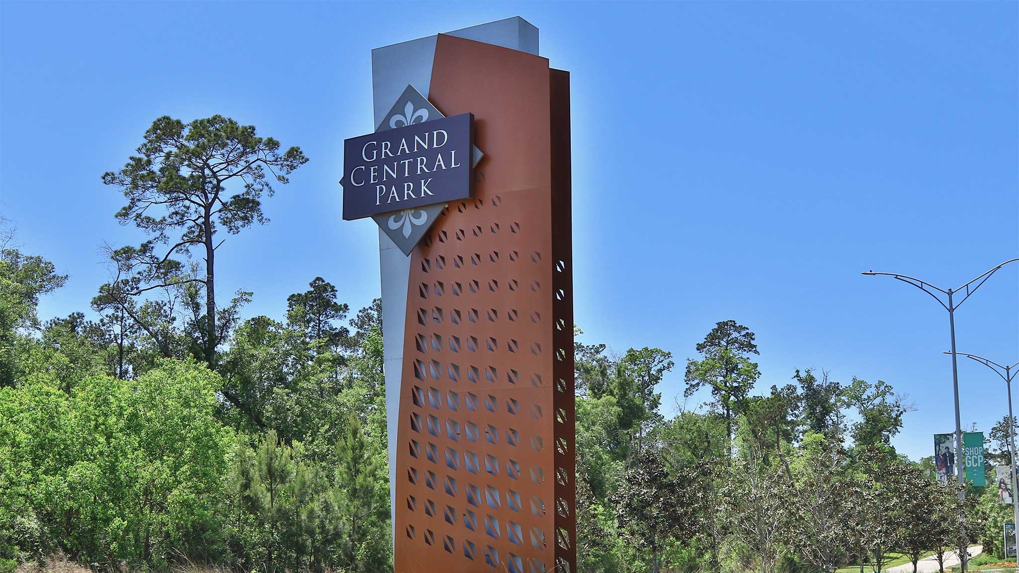 118 Sierra Strm Court Conroe, TX 77304 - Photo 14 of 20 an aerial view of a residential apartment building with a yard and plants
