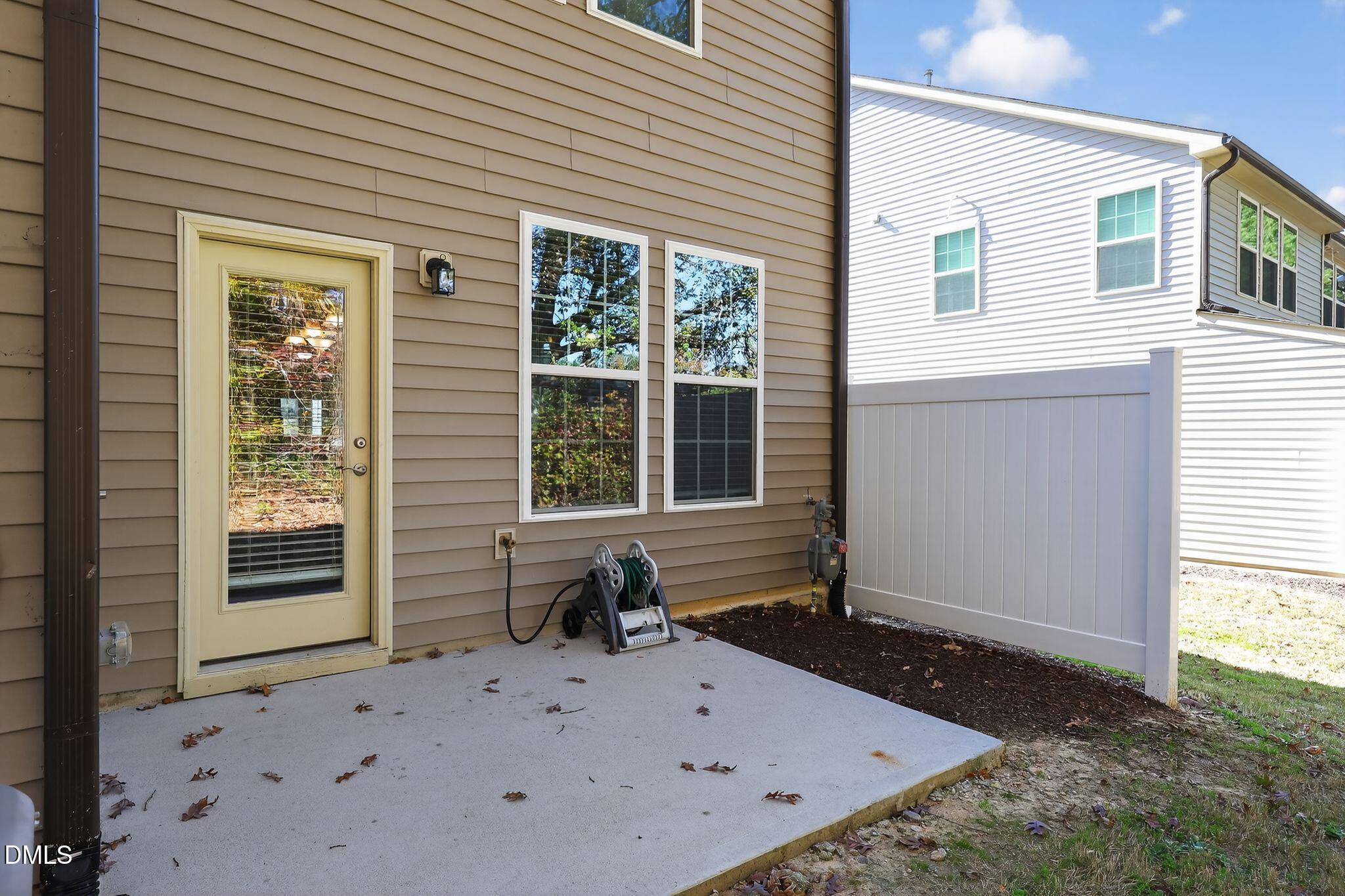 5721 Princess Curry Way Raleigh, NC 27610 - Photo 26 of 29 a view of a house with backyard and sitting area