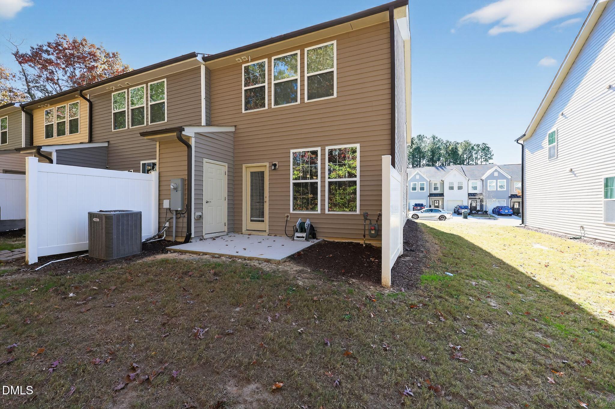 5721 Princess Curry Way Raleigh, NC 27610 - Photo 29 of 29 a view of a house with backyard and porch