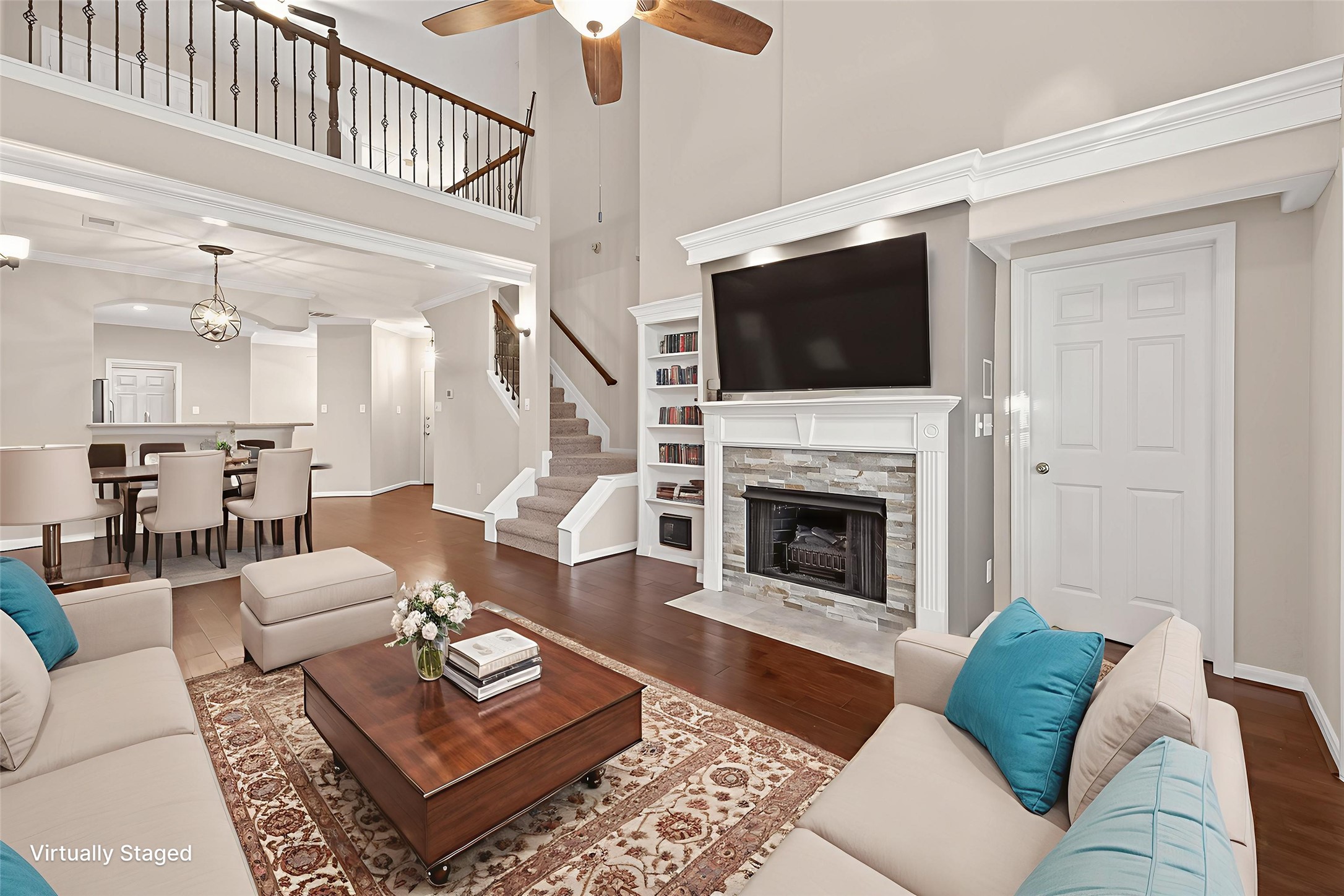 2330 Everest Way Houston, TX 77339 - Photo 14 of 49 Living room with dining room featuring Virtual Staging.