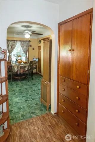 a room that has a bed and a mirror in it