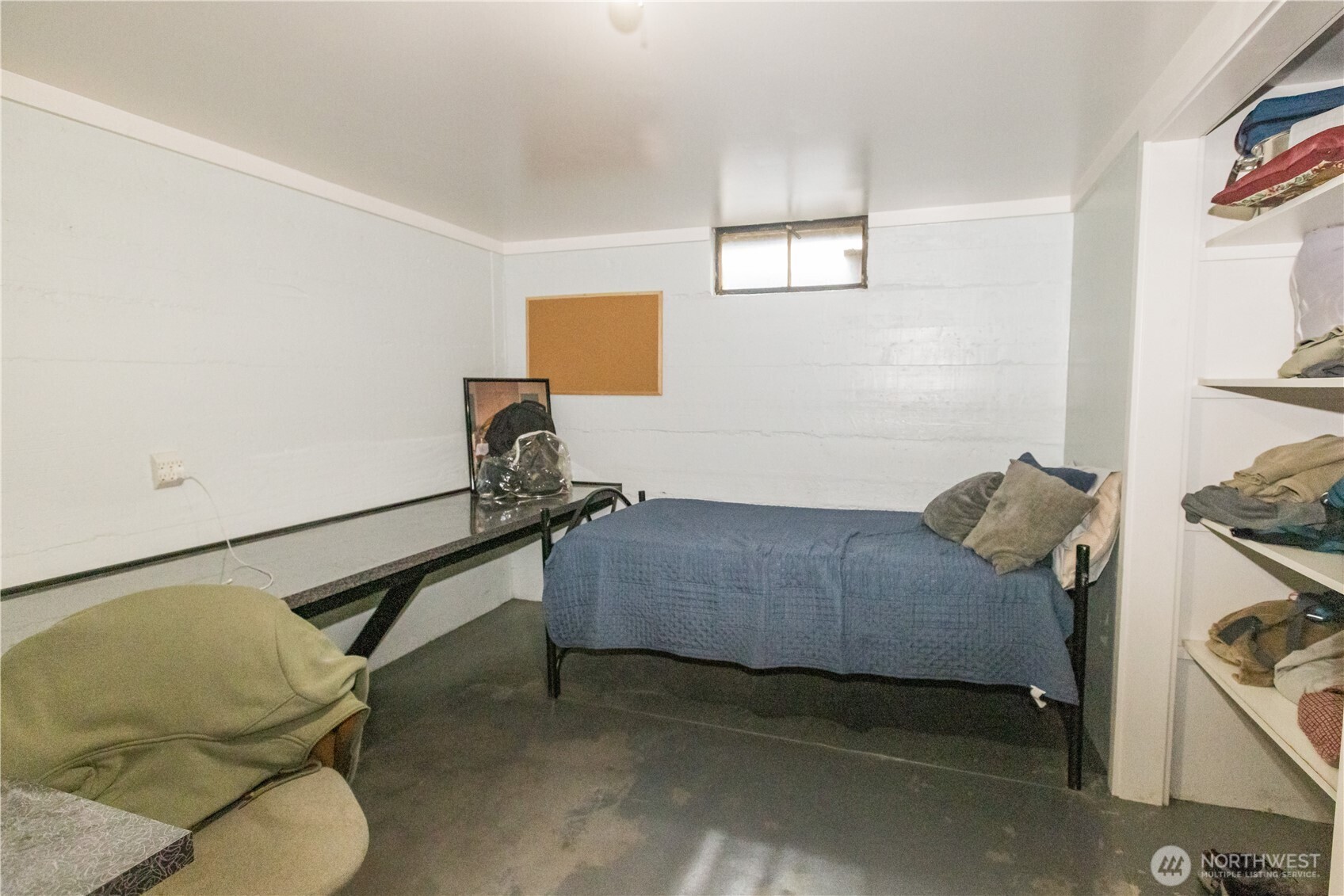 1107 South 4th Street Dayton, WA 99328 - Photo 26 of 31 a bedroom with a bed and furniture