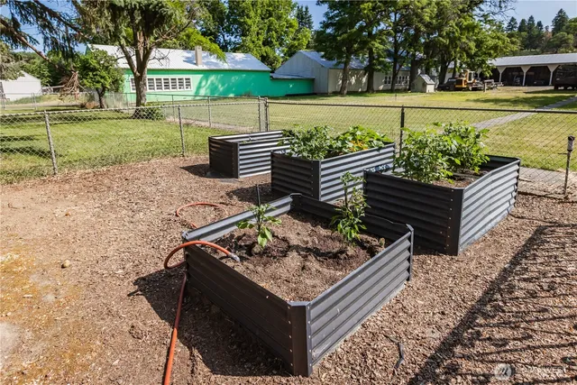 a bench sitting in the middle of a park