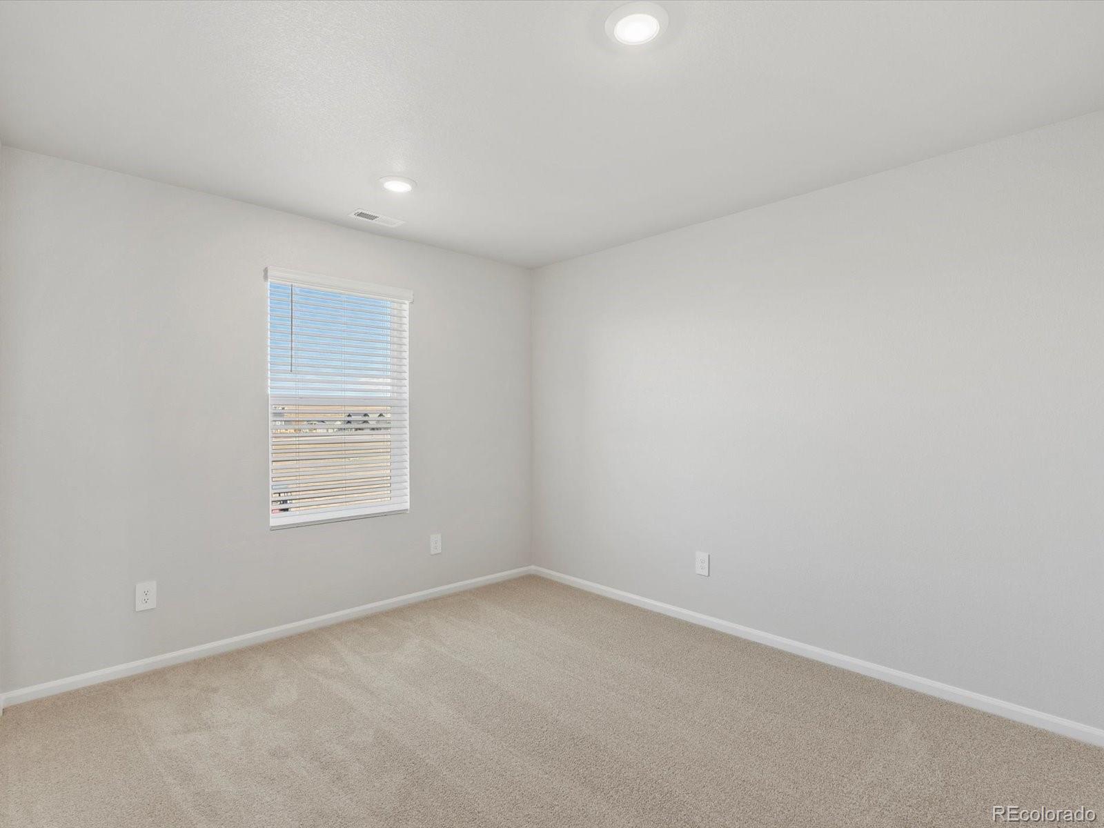 7335 West 27th Street Greeley, CO 80634 - Photo 15 of 25 an empty room with a window