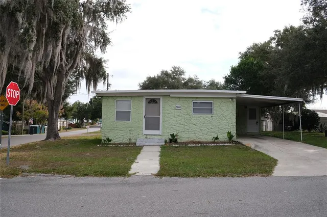 front view of a house and a yard