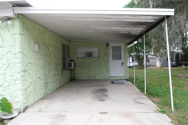 a view of a back yard of the house
