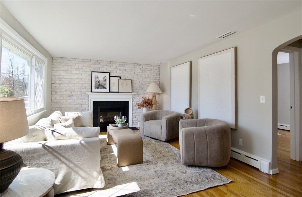 132 Lincoln Street West Springfield, MA 01089 - Photo 5 of 42 a living room with furniture and a fireplace