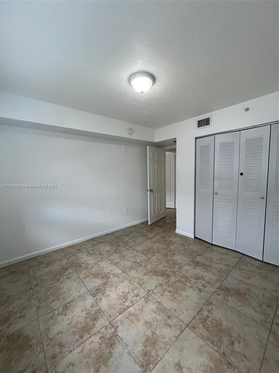 15422 Southwest 284th Street, Unit 7104 Homestead, FL 33033 - Photo 14 of 31 a view of an empty room