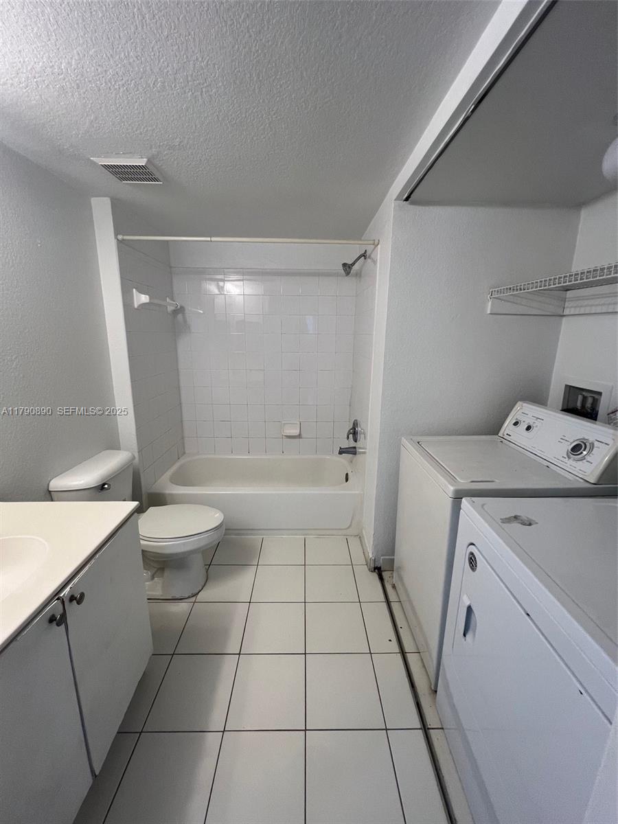 15422 Southwest 284th Street, Unit 7104 Homestead, FL 33033 - Photo 15 of 31 a bathroom with a sink and a shower