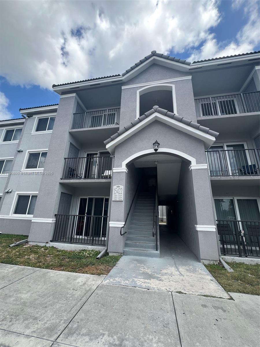 15422 Southwest 284th Street, Unit 7104 Homestead, FL 33033 - Photo 2 of 31 a front view of a house