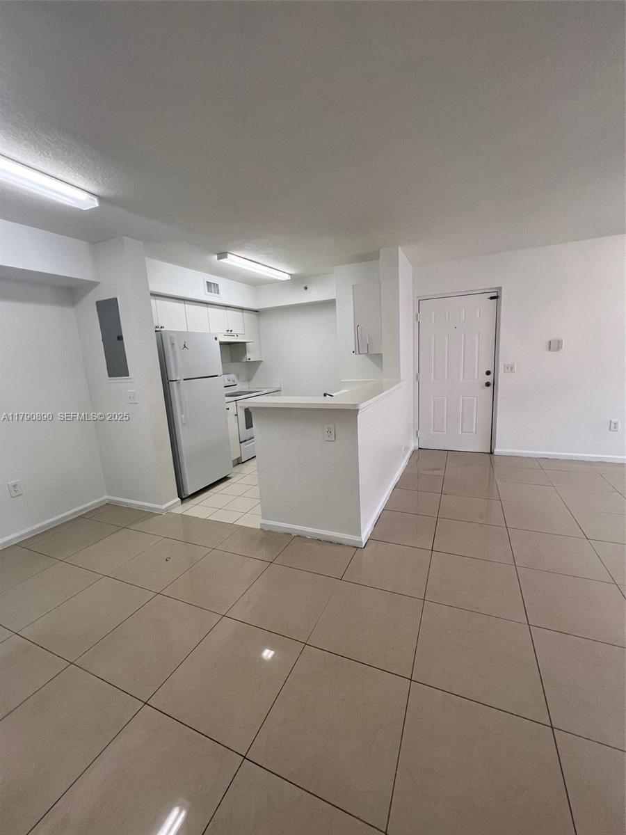 15422 Southwest 284th Street, Unit 7104 Homestead, FL 33033 - Photo 22 of 31 a view of a storage & utility room with a sink