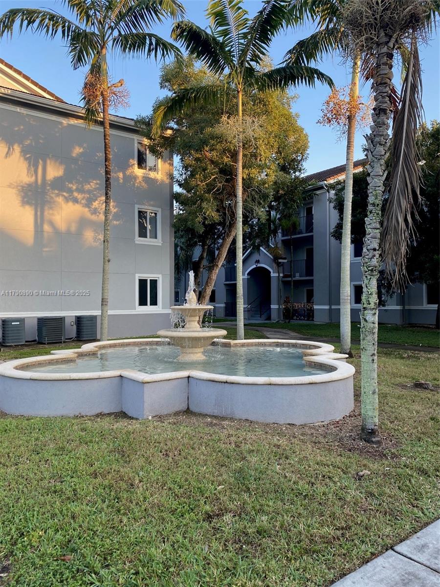 15422 Southwest 284th Street, Unit 7104 Homestead, FL 33033 - Photo 27 of 31 a view of outdoor space yard and swimming pool