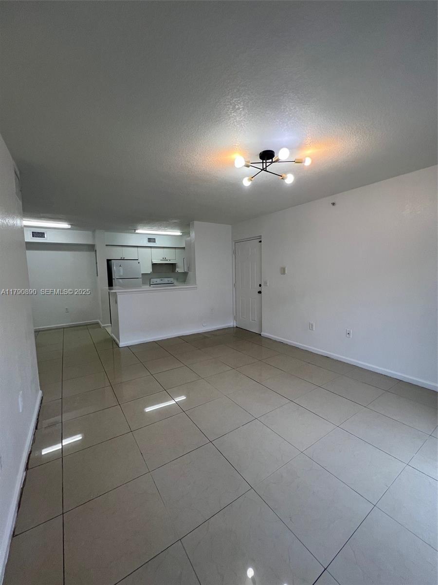 15422 Southwest 284th Street, Unit 7104 Homestead, FL 33033 - Photo 6 of 31 a view of a garage