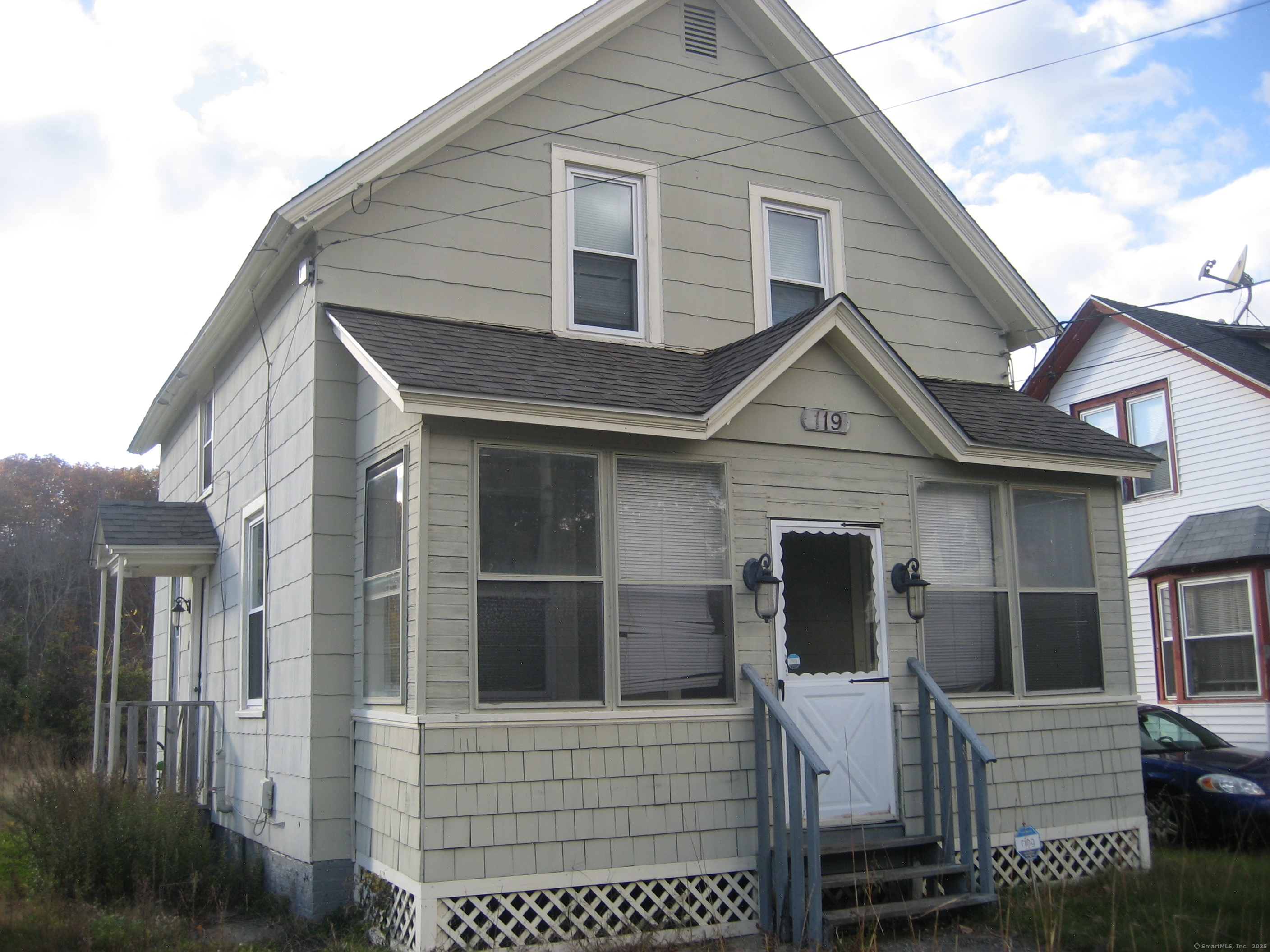 a front view of a house with a garage