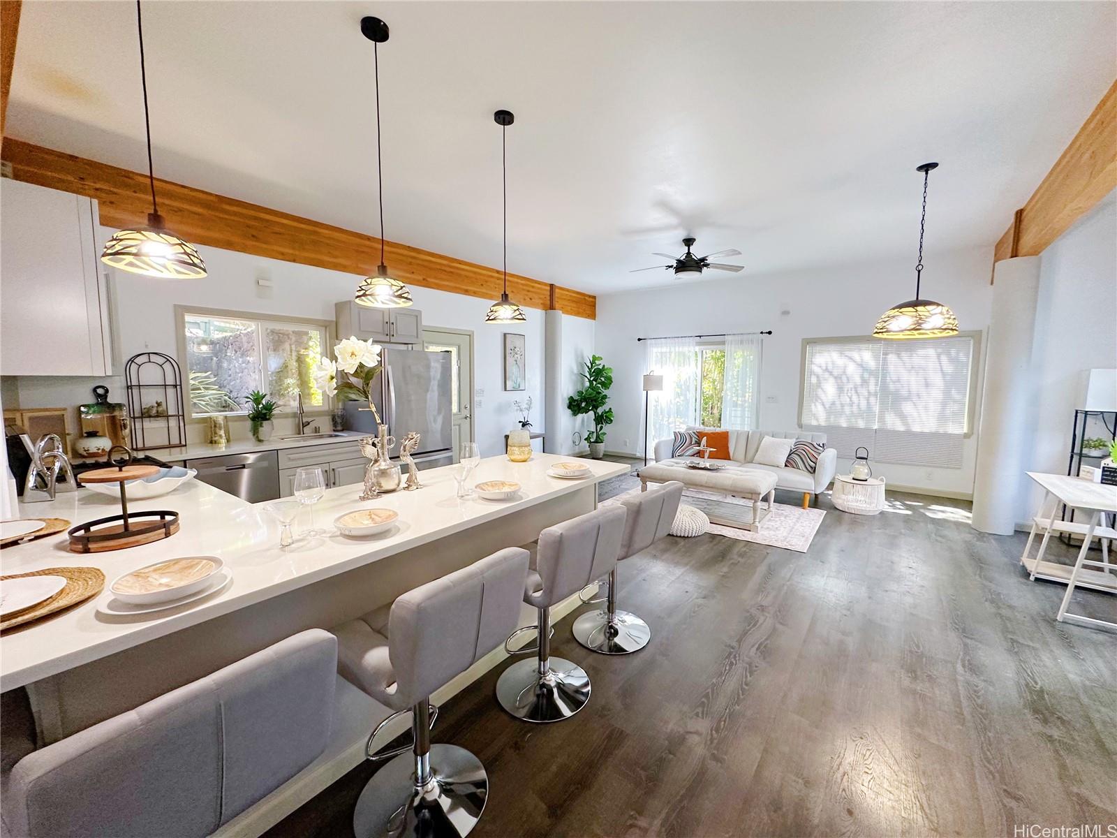 2578 Pacific Heights Road Honolulu, HI 96813 - Photo 4 of 25 a very nice looking dining room with wooden floor and furniture