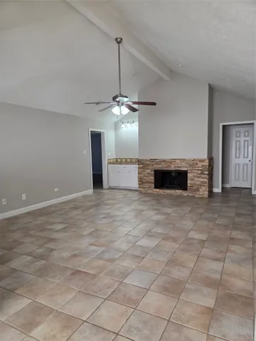 a view of a livingroom with furniture