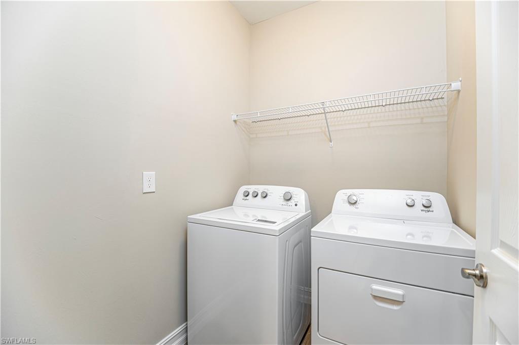1003 Enbrook Loop Naples, FL 34114 - Photo 11 of 20 a utility room with dryer and washer