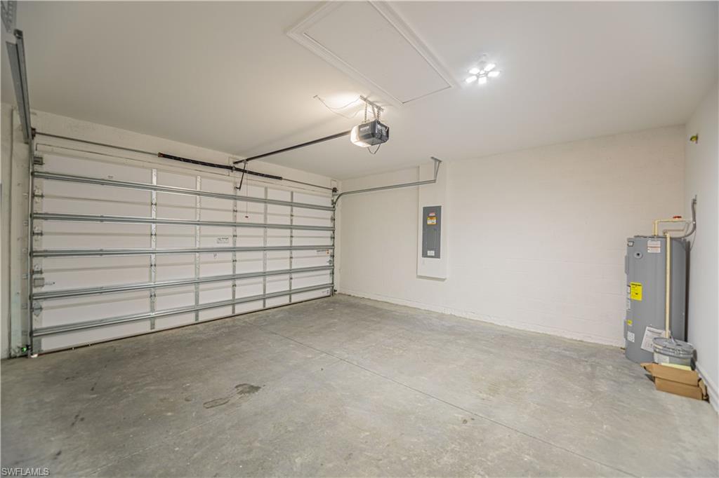 1003 Enbrook Loop Naples, FL 34114 - Photo 17 of 20 an empty room with a empty space and windows