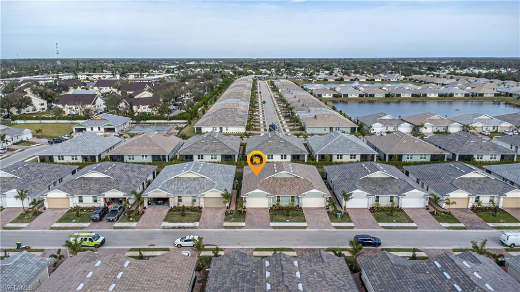 1003 Enbrook Loop Naples, FL 34114 - Photo 19 of 20 an aerial view of residential building with outdoor space