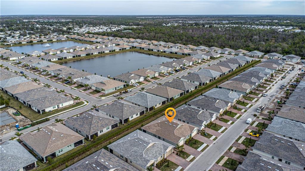 1003 Enbrook Loop Naples, FL 34114 - Photo 20 of 20 an aerial view of a city