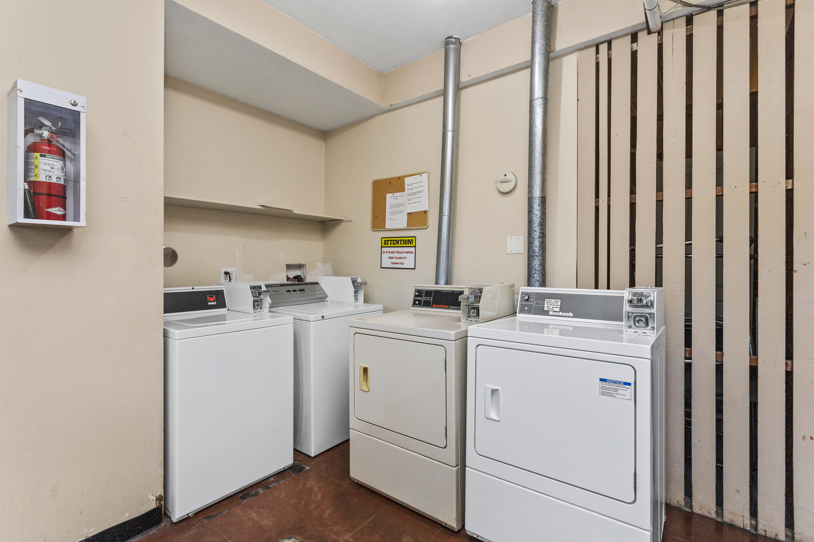 6060 North Ridge Avenue, Unit 2H Chicago, IL 60660 - Photo 14 of 23 a utility room with dryer and washer