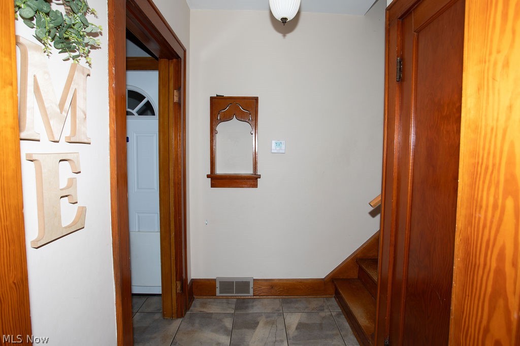 213 Como Street Struthers, OH 44471 - Photo 14 of 25 Entry way with automatic lighting