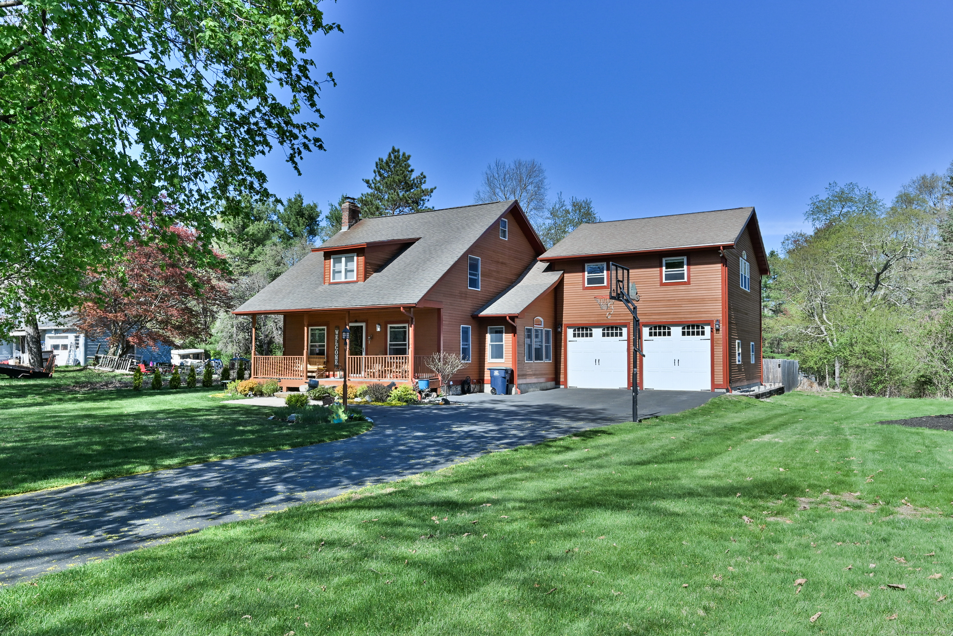 35 Walker Road Thompson, CT 06262 - Photo 1 of 1 a front view of a house with a yard