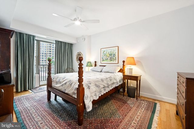 a view of building with yard and staircase