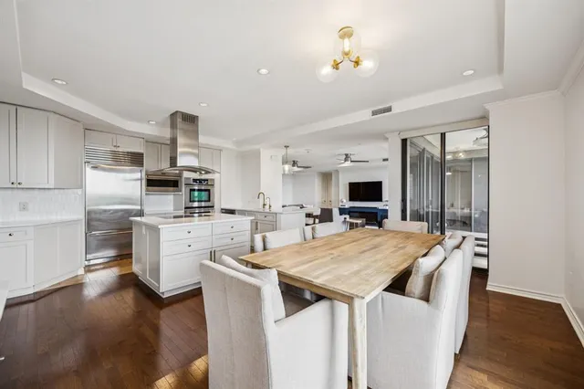 a view of cabinets with wooden floor