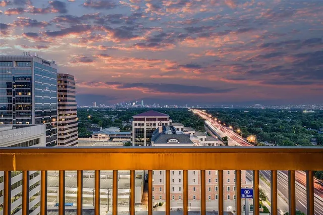 a view of city from a balcony