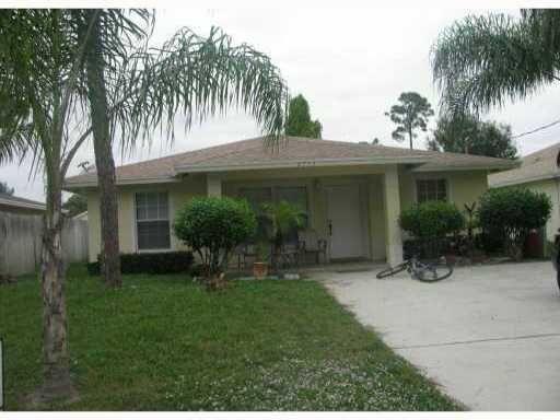 6773 2nd Street Limestone Creek, FL 33458 - Photo 1 of 1 Jupiter front