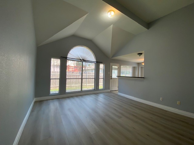1512 Lorson Loop Round Rock, TX 78665 - Photo 14 of 29 an empty room with wooden floor and windows