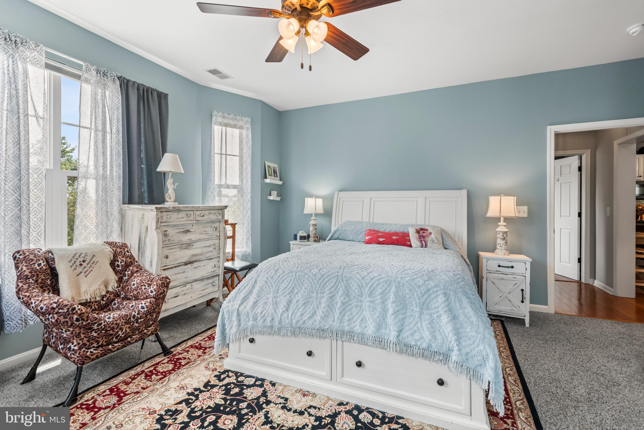 900 Marshy Cove, Unit 103 Cambridge, MD 21613 - Photo 11 of 19 a bedroom with a bed and window